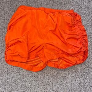 Orange shorts with stretchy waistband
